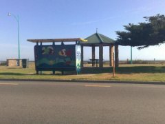 Bus stop on safety Bay road, near Beach, showing gas bbq, gazebo for picnic,  and the colorful artistic feature